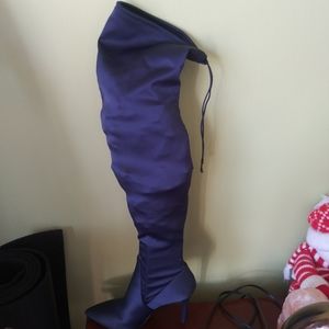 A pair of Midnight Stretch Satin 11M